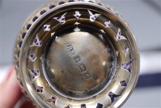 An Edwardian silver sugar basket, with blue glass liner(chip to rim) and an engraved silver cigarette case, 4.5 oz.